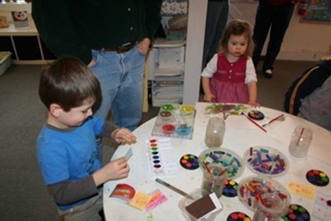 Students in the Art Explorers class at Art at the Center in Mount Vernon explore mediums like clay, collage, painting and drawing. Experts say creating art helps children build relationships.