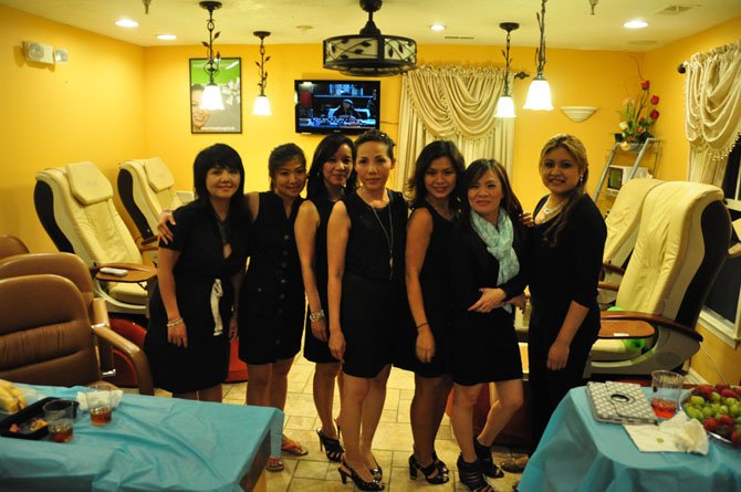 Employees of Great Falls Nails and Spa, which celebrated a new name and re-opening Saturday, Sept. 14. 
