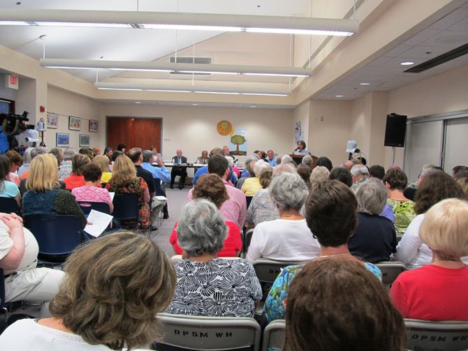 Tresa Schlecht, a member of the Board of the Friends of Tysons-Pimmit Regional Library, was one of five public speakers during the Sept. 11 Fairfax County Library Board of Trustees meeting held at George Mason Regional Library in Annandale. She criticized the library’s process for discarding books and urged board members to reconsider the “beta” plan. 