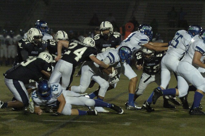 South Lakes’ Khayri Denny carries the ball against WashingtonLee.