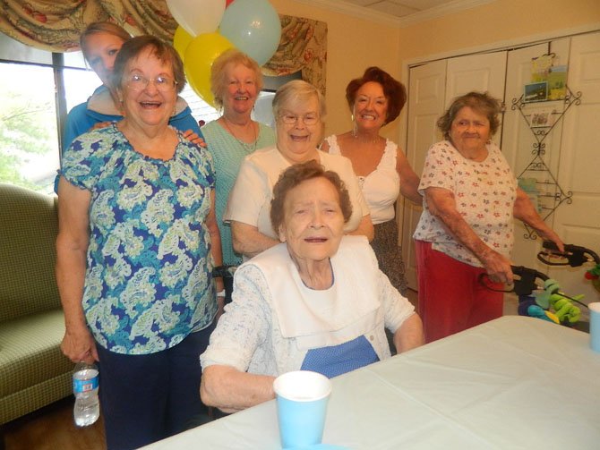 Evelyn Wood, center, celebrates her 100th birthday with Bea Higgins, Higgins’ granddaughter Olivia, Beanie Lambert, Skippy Lacey, Betty Whitefoot and Joy Reed. 