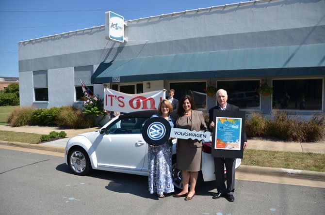 Mayor Lisa Merkel (left) stands with the Director of State Government Relations for Volkswagen Group of America Nicole Barranco, and President of the Herndon Foundation for the Cultural Arts Harlon Reece.