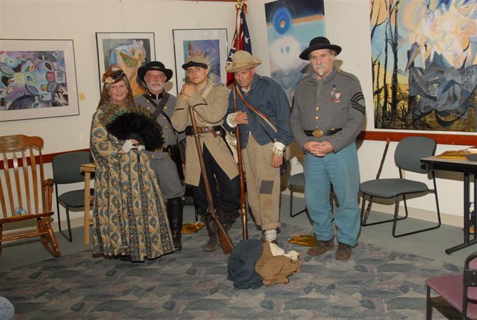 Civil War reenactors (from left) Debbie Turner as Pauline Mosby; Rick Turner as John S. Mosby; Addison Speer as a Civil War private; his father, Harvey Speer, as a confederate soldier; and Ray Borden as a Confederate Infantry Color Sergeant.