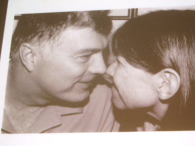 Martin Bodrog and wife Melanie, in one of a series of family photos displayed on large screens in the atrium of Springfield’s Immanuel Bible Church during a Celebration of Life memorial service for Bodrog. 