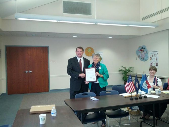 Supervisor Pat S. Herrity (R-Springfield) signs a proclamation designating Sept. 17 as United States Constitution Day in the Springfield District.