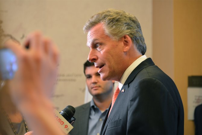 Terry McAuliffe takes questions from the press after his keynote speech at the 2013 VASBP Summit. 
