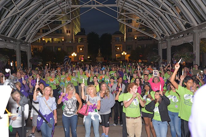 The 2013 Walk to End Alzheimer’s Reston event came to a close with a candlelight vigil and a moment of silence in the pavilion.