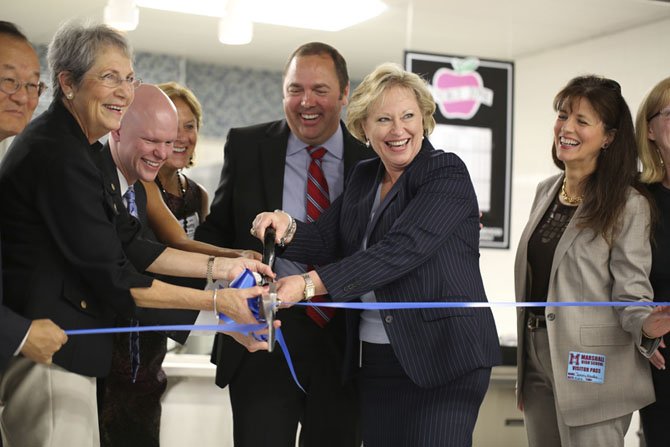 The Statesmen Station Ribbon Cutting with FCPS Board Chairman Ilryong Moon, FCPS FNS Director Penny McConnell, School Board Members Ryan McElveen and Patty Reid, Marshall HS Principal Jay Pearson, FCPS Superintendent Dr. Karen Garza and FCPS School Board Vice Chair Tammy Kaufax.