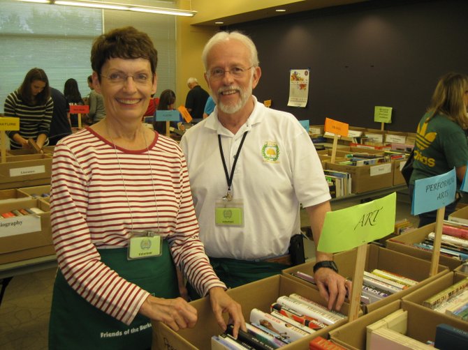 Book sale chairman Joy Whittington and Brian Engler of the Friends of the Burke Centre Library on Freds Oak Road.