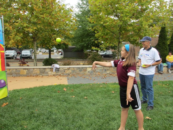 When 10-year-old cancer survivor Emily Knisley stepped up to the dunk tank, Del. Mark Keam did not stand a chance at staying dry.