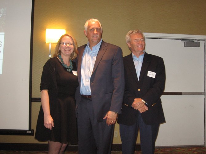 From left: Heather Arnold, Streetsense; John Tschiderer, Federal Realty Investment Trust, and Steve Bannister, Capital Investment Advisors participated in the Sept. 25 "Vibrant Streets Summit" organized by the Southeast Fairfax Development Corporation and held at the Hampton Inn & Suites.
