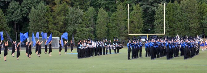 Fairfax High’s marching band and color guard performing at the Virginia Showcase of Bands.