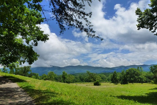 “Sunny Day in Cades Cove” captures the intense blues and greens of this place in Great Smoky Mountain National Park.  