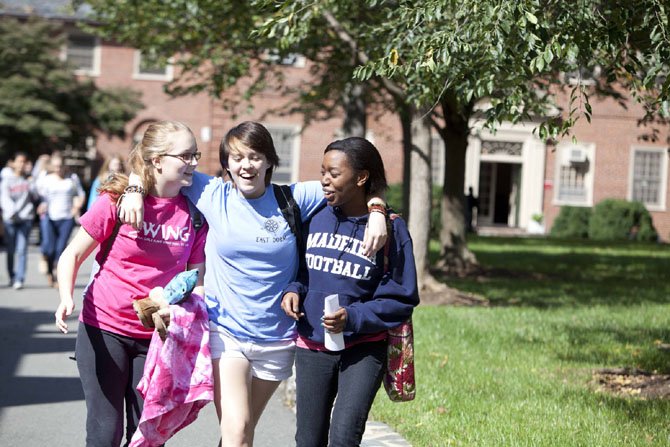 These students at The Madeira School in McLean, enjoy each other’s company on campus. School visits offer prospective families an opportunity to learn about student life.