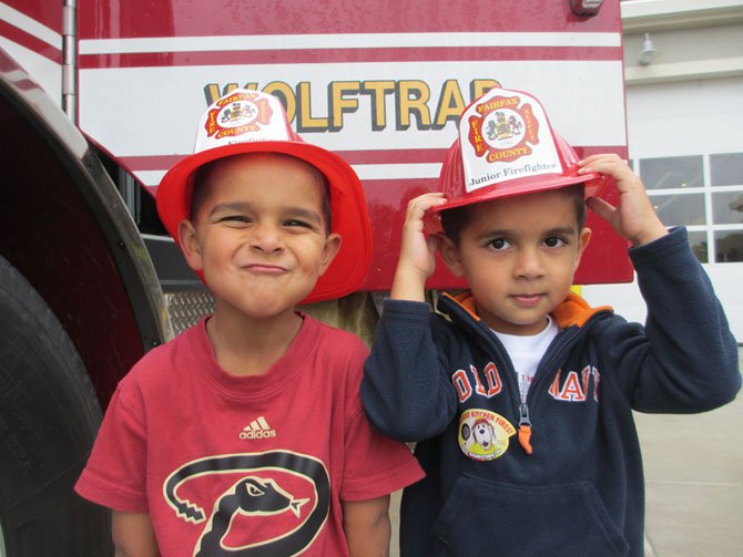 Thomas Shanmugam, 5, and his brother William, 4, of Great Falls, visited the newly-opened Wolftrap fire station at the intersection of Rt. 7 and Beulah Road in Vienna.
