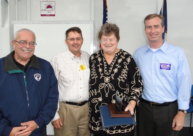 From left are U.S. Rep. Gerry Connolly (D-11) Supervisor Michael R. Frey (R-Sully), Trudy Harsh and Del. David Bulova (D-37) at the awards ceremony.