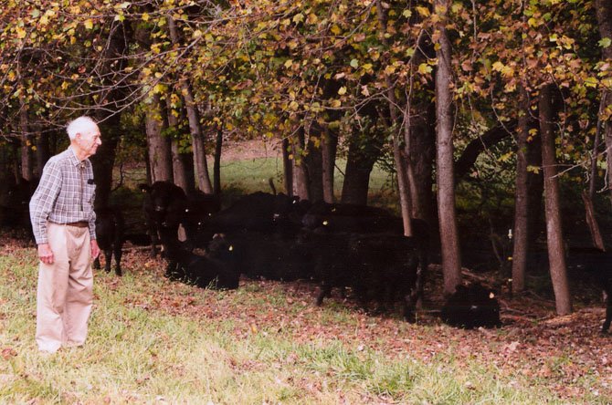 “Hello girls,” Bob Hanson called to a herd of Black Angus cattle he raises on his 200-acre farm. He drives his John Deere “Gator” through the fields to check on the animals.
