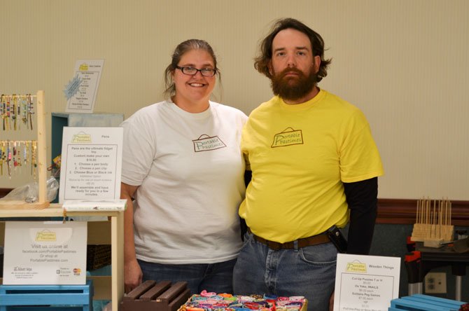 Chris and Therese Liebermann by their stand at the St. Joseph's Parish Craft Fair. 