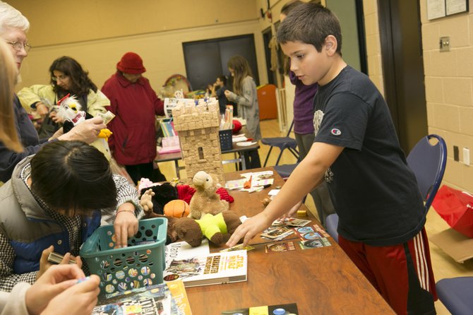 Young sellers offer bargains and learn the ins and outs of retail at the McLean Community Center’s Children’s Flea Market.
