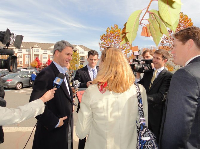 Ken Cuccinelli meets the press outside Eagle View Elementary.