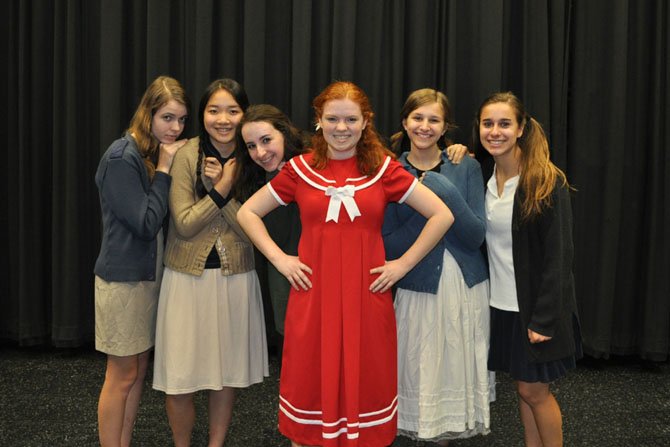 Nancy Pruett as Annie with orphan friends Nora Logsdon, Michelle Lee, Emma Gold, Tori Garcia and Helena Doms in MTC's upcoming production of Annie.	