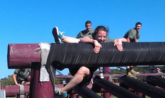 Cadets work their way through the demanding obstacle course. 