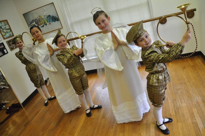 From left, Ava Campbell, Hana Belt, Shelby Wilcox, Hope Patrick and Amelia Frischling, angels and trumpeters in the Haddad School of Classical Ballet’s production of “The Nutcracker.”