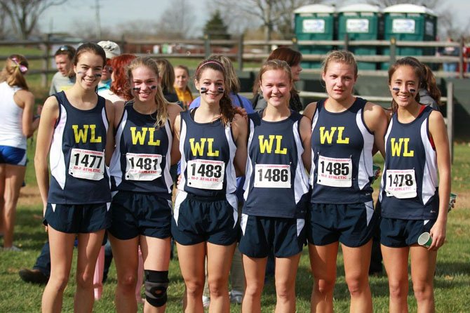The Washington-Lee girls’ cross country team placed second among 6A teams at the state meet on Nov. 15 at Great Meadow. From left are Sarah Angell, Annika Macewen, Donia Nichols and Jordan Selby, Sarah Sears and Kathryn Eng.