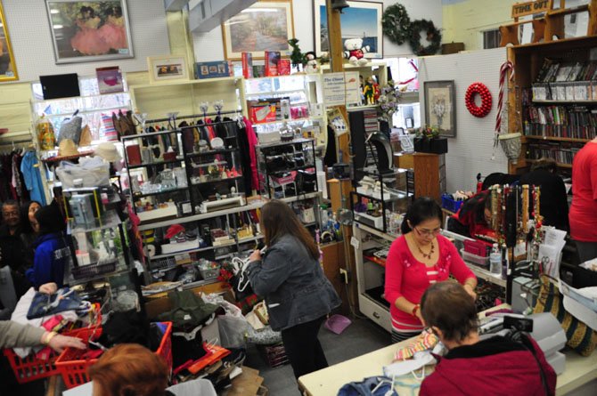 Shoppers browse The Closet in Herndon for gift ideas. 