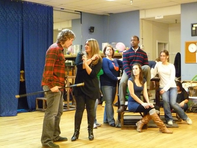 Jen Lambert rehearses with the cast of "Les Miserables."