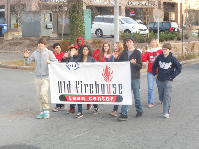 Members of the McLean Old Firehouse Teen Center march in the 2013 parade. 

