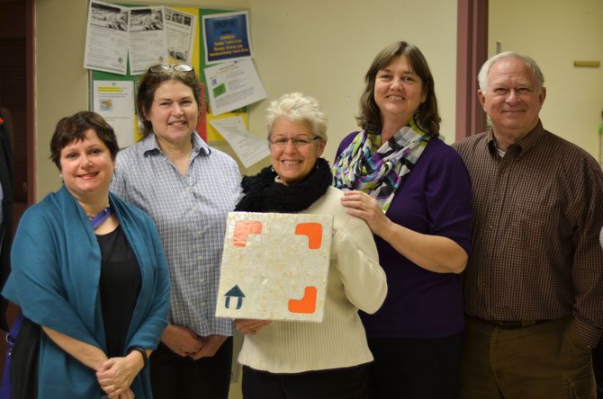 From left, Council for the Arts of Herndon Director Signe Friedrichs, Anita Damron, Gail Greenberg, Susan Alger and Leroy "Ivan" Young at the Reston Embry Rucker Shelter.