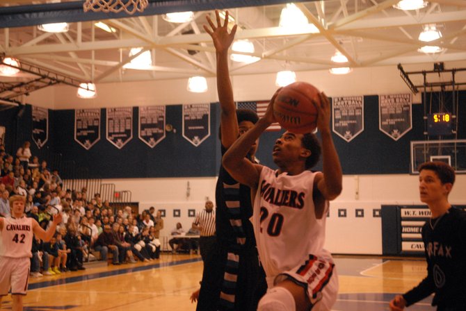 Woodson point guard Eric Bowles scored a career-high 25 points against Fairfax on Friday night.