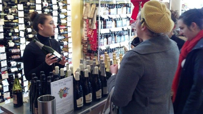 Missy Pankow, front-of-house manager at the Del Ray location of Cheesetique, lead a wine tasting last weekend to help customers get to know some new varieties. 