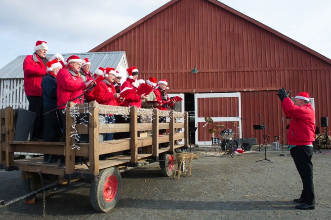 The Fairfax Jubil-Aires provide entertainment during the ‘Old Fashioned Holiday at the Farm’ celebration held at Frying Pan Farm Park on Dec. 7.
