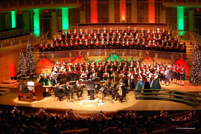 The 200-voice Washington Chorus, led by director Julian Wachner, presents its annual crowd-pleaser “A Candlelight Christmas” concert series, this year with the help of the Robinson Singers.