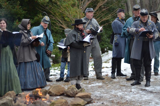 Members of the Virginia 49th Infantry, a family-oriented Civil War living history and reenactment organization, returned to Colvin Run Mill to sing Christmas carols.