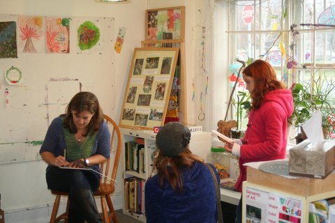 Mount Vernon-based art instructor and author Kathryn Horn Coneway signs copies of her new books during a recent launch party at Art at the Center. 