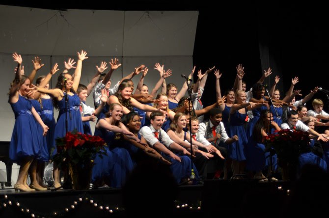 Jazz hands provided by the Herndon High Heat Wave Show Choir at their annual Winter Choir Concert.