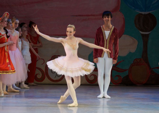 South Lakes senior Rebecca Mattern takes a final bow in her last performance in the Conservatory Ballet’s annual production of The Nutcracker.