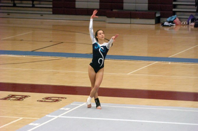 Washington-Lee junior Annie Hatcher finished third on floor during a Jan. 13 gymnastics meet at Mount Vernon High School.