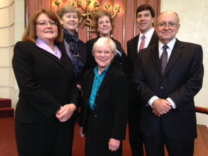 Front row, from left, Kim Fish, Fiske and Harvey, PLLC; Sally Hurne, AARP, and John Porter, executive director, ACT for Alexandria. In second row: Mary Lee Anderson, executive director, Senior Services of Alexandria; Laurie Blackburn, Speck Caudron/Well Fargo, and Tristan Caudron, Speck Caudron/Wells Fargo.