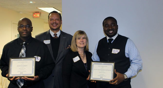 Willy Williams of Boston Market, SFDC President Walter Clarke, SFDC Executive Director Edythe Kelleher, and Yaw Opoku of Mount Vernon Square Apartments at the Mary Thonen Awards. Boston Market and Mount Vernon Square Apartments were silver level recipients for the Mary Thonen Awards, which celebrates beautification on Richmond Highway.