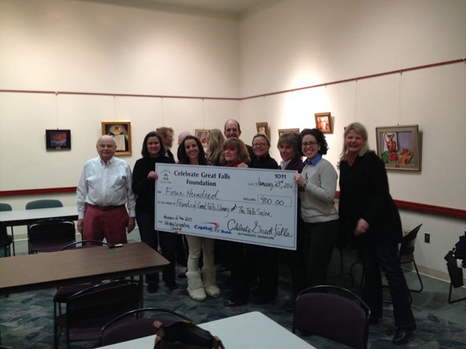 The board of directors for the Celebrate Great Falls Foundation presented the Friends of the Great Falls Library with a check for $400.