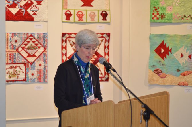 Dorry Emmer, a resident of Great Falls speaks briefly at the ArtSpace Herndon’s artists reception.