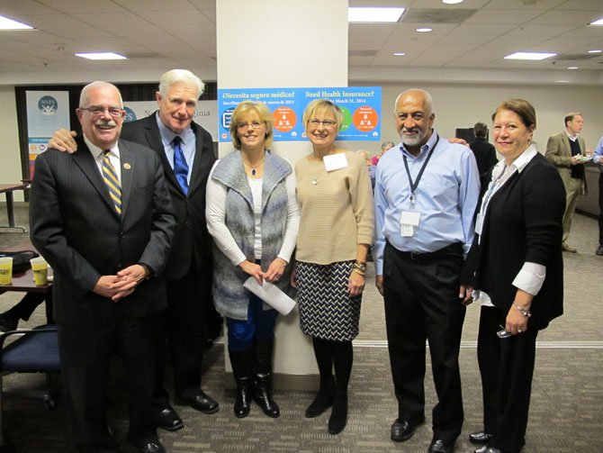 Rep. Gerry Connolly and Rep. Jim Moran thank Northern Virginia Family Service’s Health Access team for their leadership in helping Northern Virginians successfully enroll in the new health care system: Cyndy Dailey, NVFS director of health and mental health services; Terry Goplerud and Ken Sharma, NVFS Marketplace coordinators; and Carmen Aponte, NVFS Marketplace assistant. 