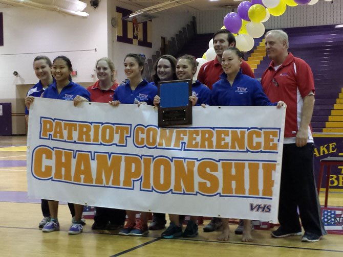 The T.C. Williams gymnastics team won the Conference 7 championship on Jan. 31. Gymnasts pictured from left: Jordan Mambert, Grace Girard, Holland Cathey and Cailyn Lager.