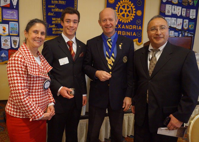 Bishop Ireton senior Giovanni Hernandez, second from right, is with St. Stephen's & St. Agnes Head of School Joan Holden, Alexandria Rotary Club president Peter Knetemann and his father Vince Hernandez after being presented with the Student Community Service Award Jan. 28 at Belle Haven Country Club.