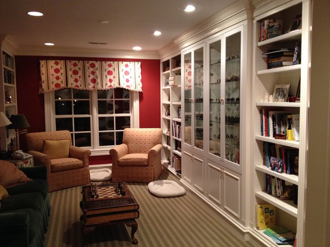 BOWA Builders, Inc. principal Steve Kirstein enclosed the top of a two-story foyer in his Potomac, Md., home to create a second-floor family gathering space. The room includes built-in book and display cases.