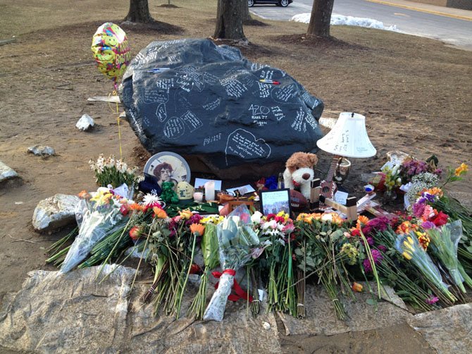 A memorial filled with items commemorating both students’ lives grew each day in front of the high school.